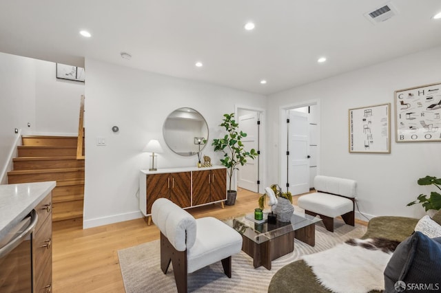 57 Niagara Ave, San Francisco, CA 94112 - living area with light wood finished floors, stairs, and recessed lighting