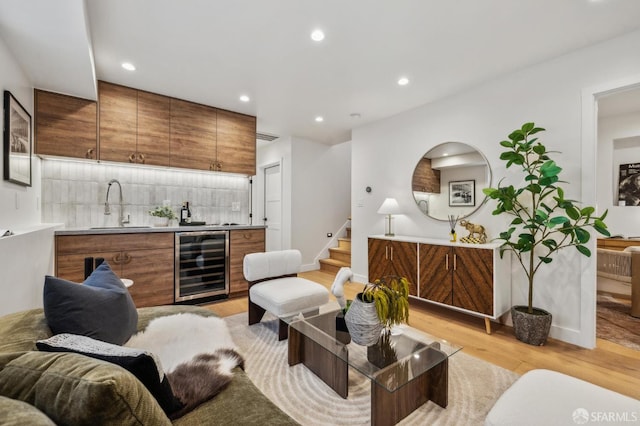 57 Niagara Ave, San Francisco, CA 94112 - living room with beverage cooler, wet bar, light wood-type flooring, recessed lighting, and stairway