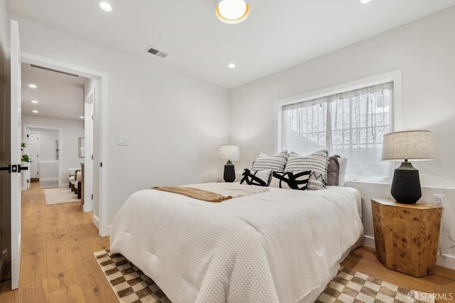 57 Niagara Ave, San Francisco, CA 94112 - bedroom featuring light wood finished floors and recessed lighting