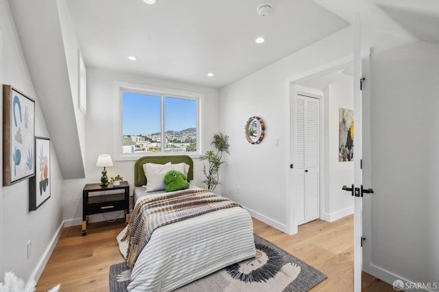 57 Niagara Ave, San Francisco, CA 94112 - bedroom featuring light wood-style flooring and recessed lighting