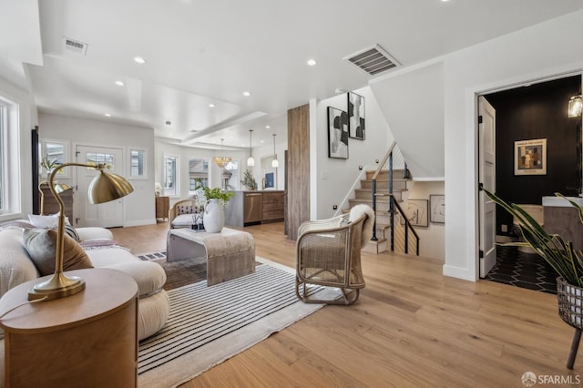 57 Niagara Ave, San Francisco, CA 94112 - living room with light wood-style floors, stairs, and recessed lighting
