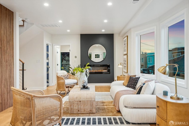 57 Niagara Ave, San Francisco, CA 94112 - living room featuring a large fireplace, recessed lighting, and wood finished floors