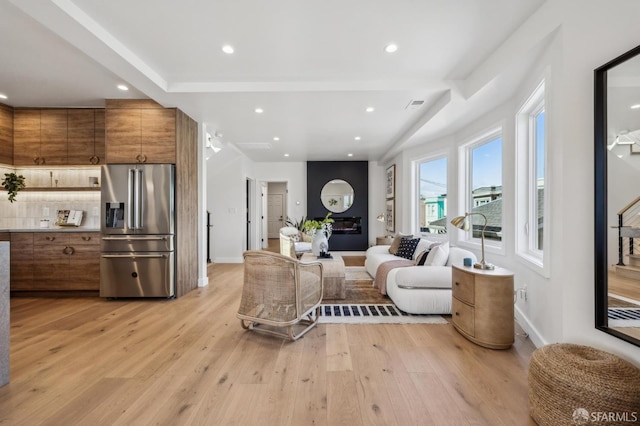 57 Niagara Ave, San Francisco, CA 94112 - living room featuring light wood-style floors, recessed lighting, and a fireplace