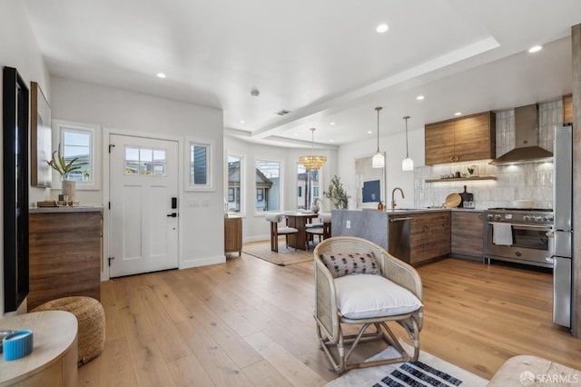 57 Niagara Ave, San Francisco, CA 94112 - entrance foyer with light wood finished floors, recessed lighting, and healthy amount of natural light