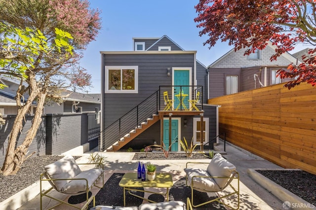 57 Niagara Ave, San Francisco, CA 94112 - rear view of property featuring stairway and a patio