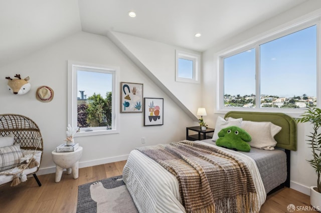 57 Niagara Ave, San Francisco, CA 94112 - bedroom featuring vaulted ceiling, wood finished floors, and recessed lighting