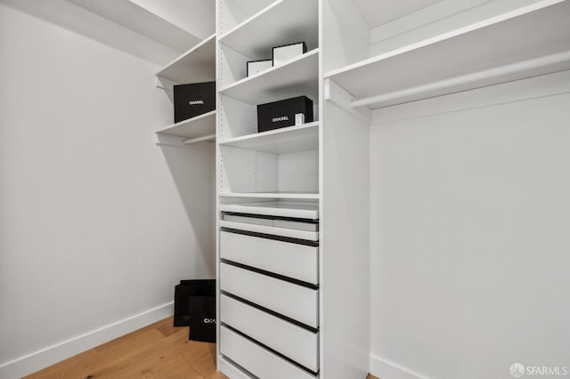 57 Niagara Ave, San Francisco, CA 94112 - walk in closet with light wood-style floors