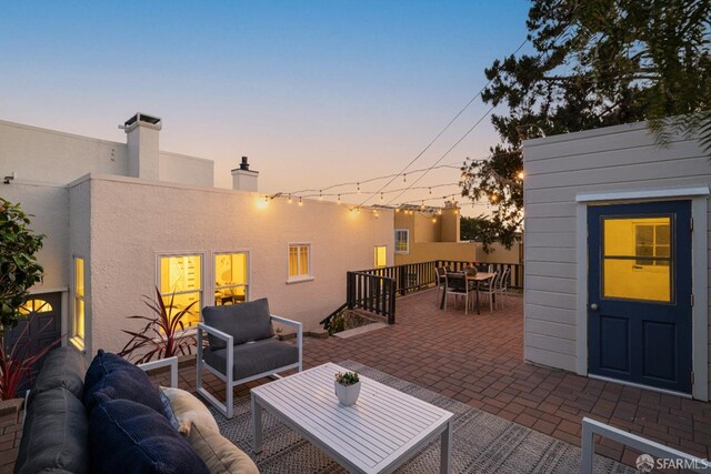 130 Cerritos Ave, San Francisco, CA 94127 - patio terrace at dusk featuring outdoor lounge area, outdoor dining space, and a patio area