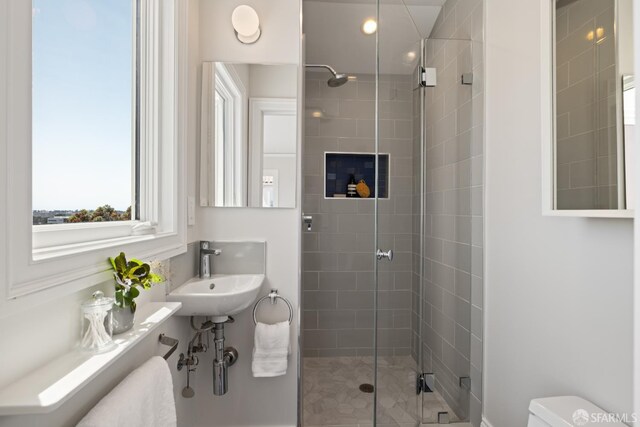 130 Cerritos Ave, San Francisco, CA 94127 - full bathroom with a shower stall, healthy amount of natural light, toilet, and a sink