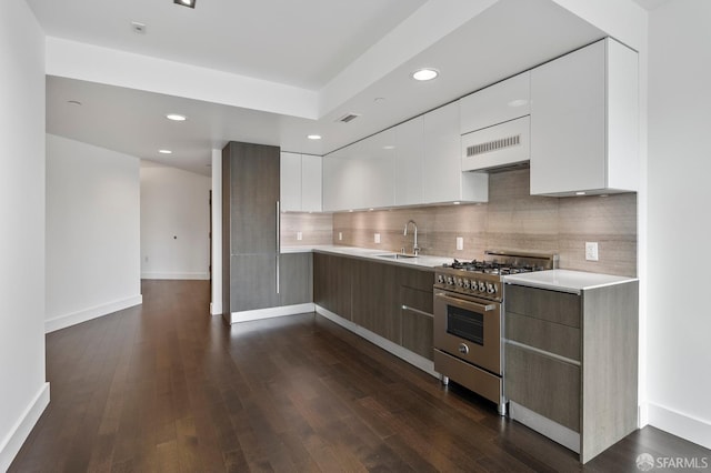 8 Buchanan St Unit 202, San Francisco, CA 94102 - kitchen featuring modern cabinets, stainless steel stove, a sink, light countertops, and recessed lighting