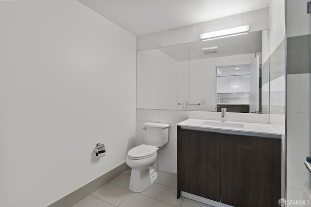 8 Buchanan St Unit 202, San Francisco, CA 94102 - bathroom with toilet, vanity, tile patterned floors, and baseboards