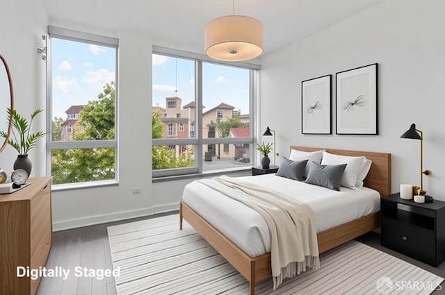 8 Buchanan St Unit 202, San Francisco, CA 94102 - bedroom featuring wood finished floors and baseboards