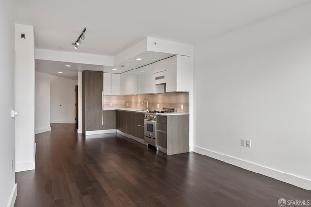 8 Buchanan St Unit 202, San Francisco, CA 94102 - kitchen with modern cabinets, stainless steel range, light countertops, white cabinets, and a sink