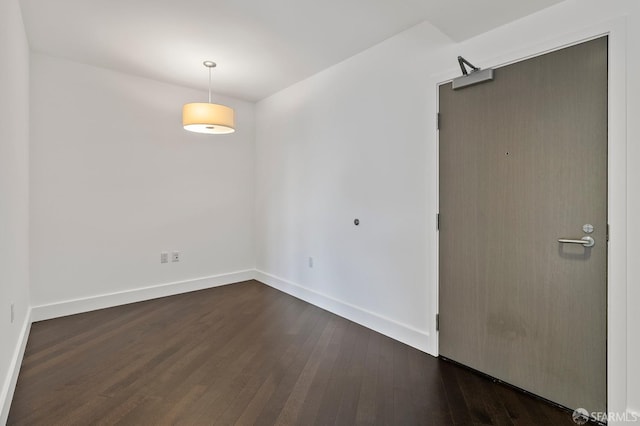 8 Buchanan St Unit 202, San Francisco, CA 94102 - empty room featuring dark wood-style floors and baseboards