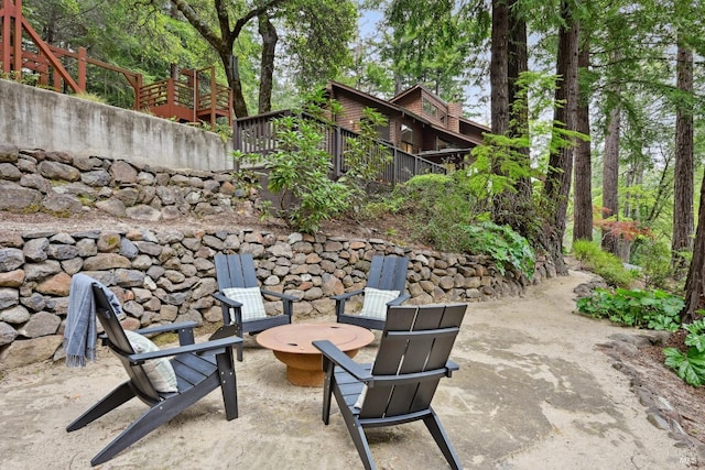 view of patio / terrace with an outdoor fire pit