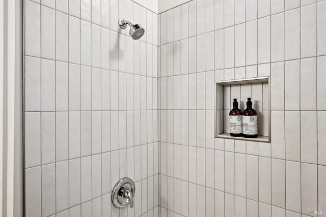 details with a tile shower