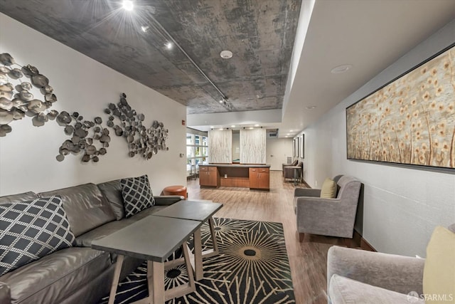 living room with hardwood / wood-style flooring