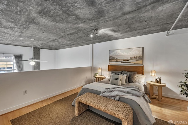 bedroom featuring hardwood / wood-style flooring