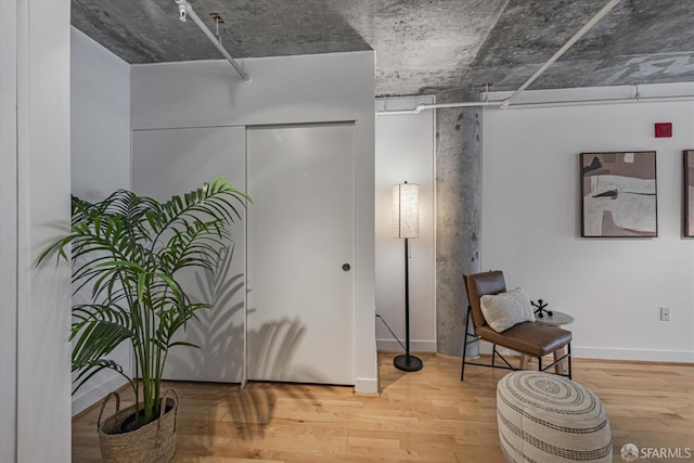 living area featuring hardwood / wood-style floors