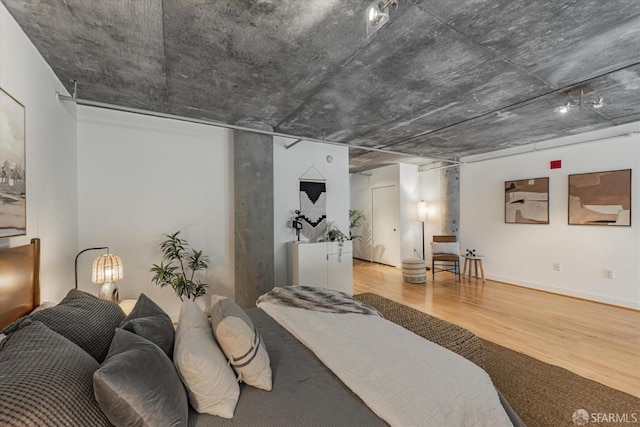 bedroom featuring hardwood / wood-style floors