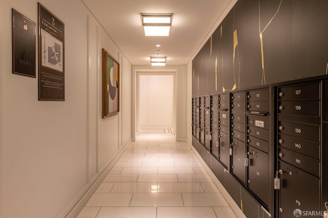 875 California St Unit 403, San Francisco, CA 94108 - hall with mail area, light tile patterned flooring, and baseboards