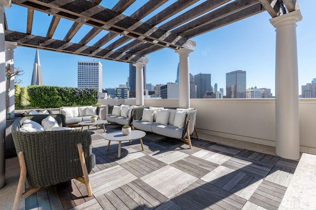 875 California St Unit 403, San Francisco, CA 94108 - wooden terrace featuring a view of skyline, a pergola, and outdoor lounge area