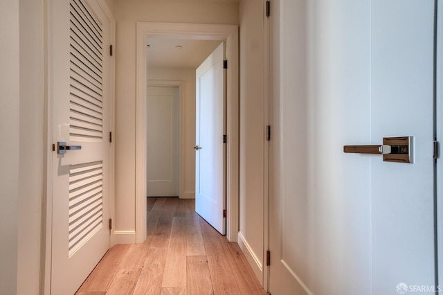 875 California St Unit 403, San Francisco, CA 94108 - hallway with light wood-style flooring and baseboards