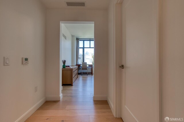 875 California St Unit 403, San Francisco, CA 94108 - corridor with light wood-style flooring and baseboards