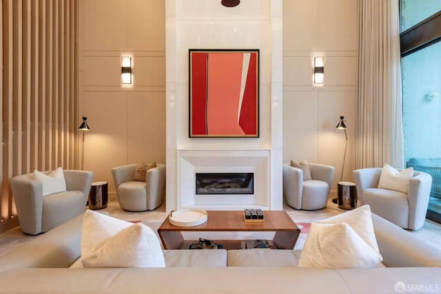 875 California St Unit 403, San Francisco, CA 94108 - living area featuring a glass covered fireplace and a decorative wall