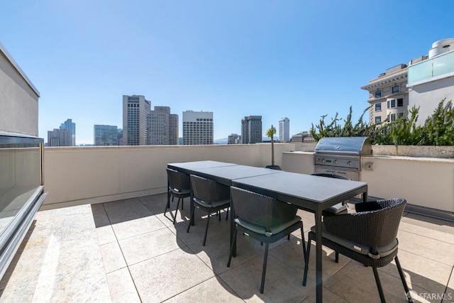 875 California St Unit 403, San Francisco, CA 94108 - view of patio / terrace with grilling area, exterior kitchen, a skyline view, and outdoor dining space