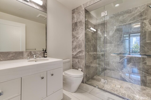 875 California St Unit 403, San Francisco, CA 94108 - full bathroom with a stall shower, toilet, and vanity