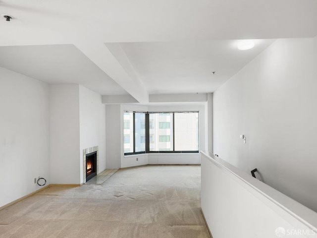 601 Van Ness Ave Unit 71, San Francisco, CA 94102 - unfurnished living room featuring light colored carpet and a fireplace