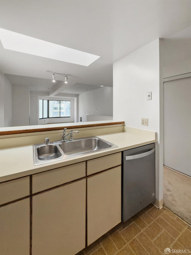 601 Van Ness Ave Unit 71, San Francisco, CA 94102 - kitchen featuring dishwasher, a skylight, dark carpet, and light countertops