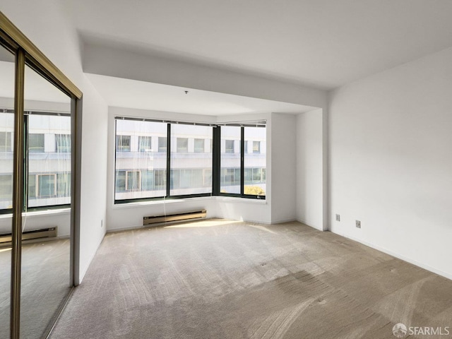 601 Van Ness Ave Unit 71, San Francisco, CA 94102 - carpeted spare room with a baseboard radiator