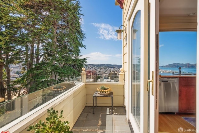 balcony with a mountain view and sink