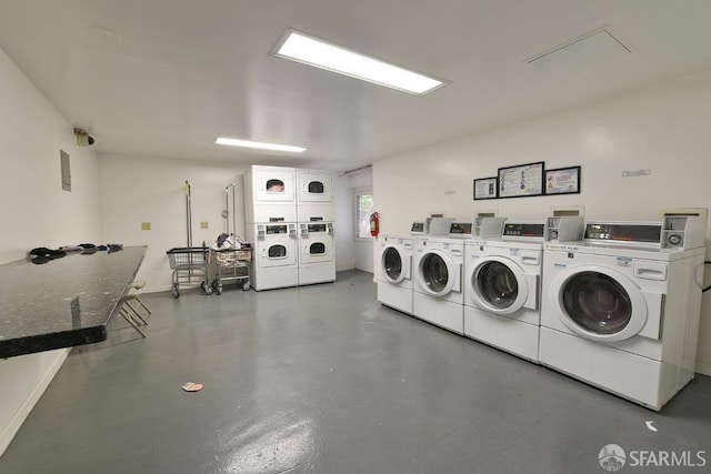 community laundry room featuring stacked washer / dryer and independent washer and dryer