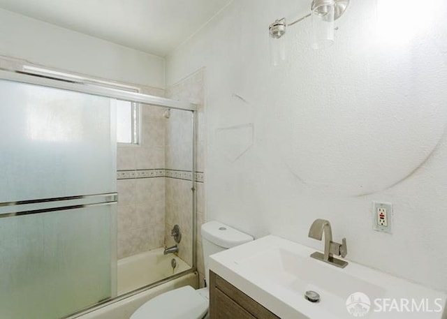 615 Wernmark Dr, Red Bluff, CA 96080 - bathroom with toilet, shower / bath combination with glass door, and vanity