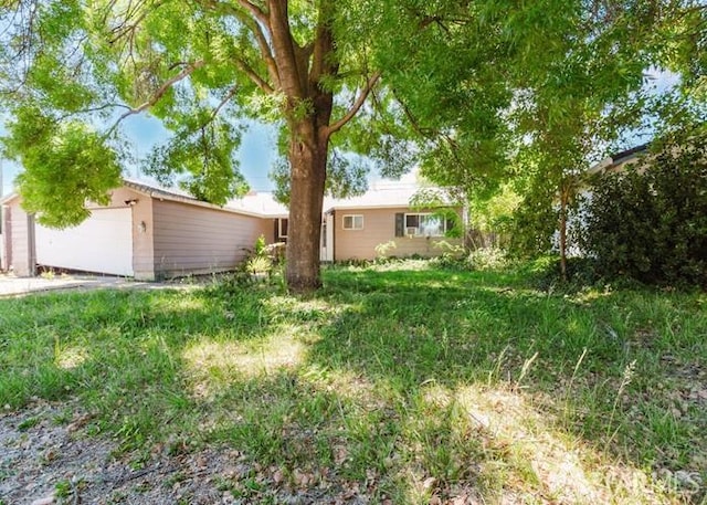 615 Wernmark Dr, Red Bluff, CA 96080 - view of yard featuring a garage