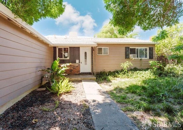 615 Wernmark Dr, Red Bluff, CA 96080 - view of exterior entry featuring brick siding