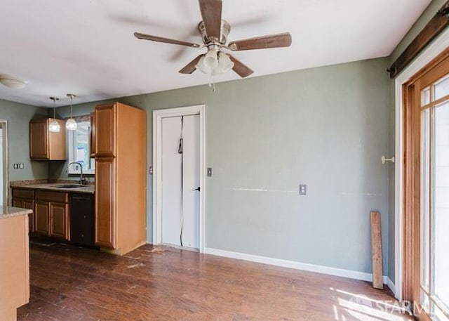 615 Wernmark Dr, Red Bluff, CA 96080 - kitchen featuring dark wood-type flooring, plenty of natural light, a sink, and a ceiling fan