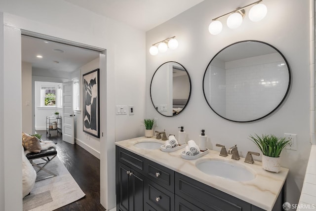 438 Broderick St, San Francisco, CA 94117 - full bath featuring double vanity, wood finished floors, and baseboards