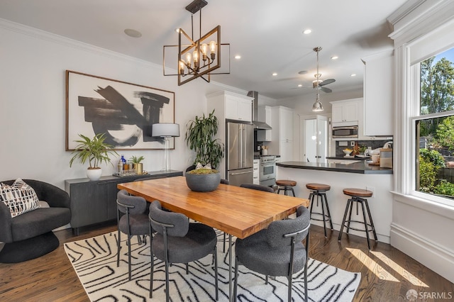438 Broderick St, San Francisco, CA 94117 - dining space with dark wood-style floors, crown molding, recessed lighting, and a chandelier
