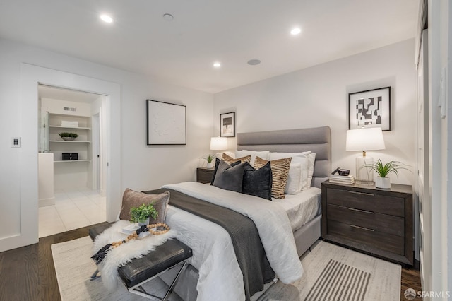 438 Broderick St, San Francisco, CA 94117 - bedroom with light wood-style flooring and recessed lighting