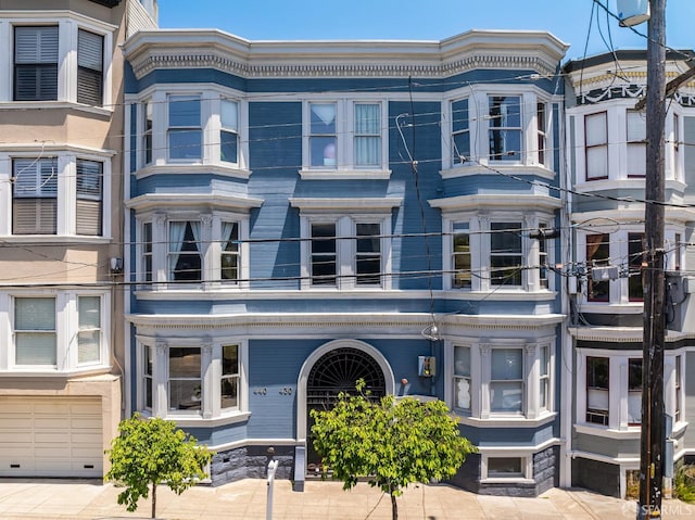 438 Broderick St, San Francisco, CA 94117 - townhome / multi-family property with an attached garage and a balcony