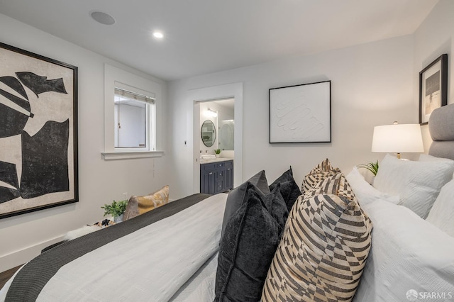 438 Broderick St, San Francisco, CA 94117 - bedroom with connected bathroom and recessed lighting