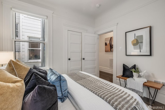 438 Broderick St, San Francisco, CA 94117 - bedroom featuring baseboards and wood finished floors