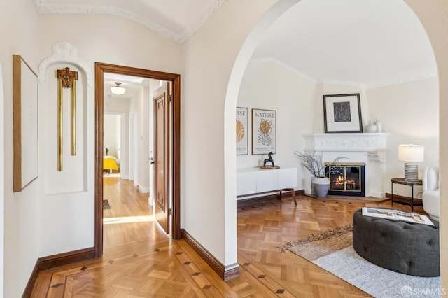 hall featuring lofted ceiling and light parquet floors