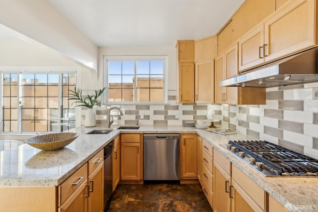 kitchen featuring sink, appliances with stainless steel finishes, light stone countertops, light brown cabinetry, and decorative backsplash