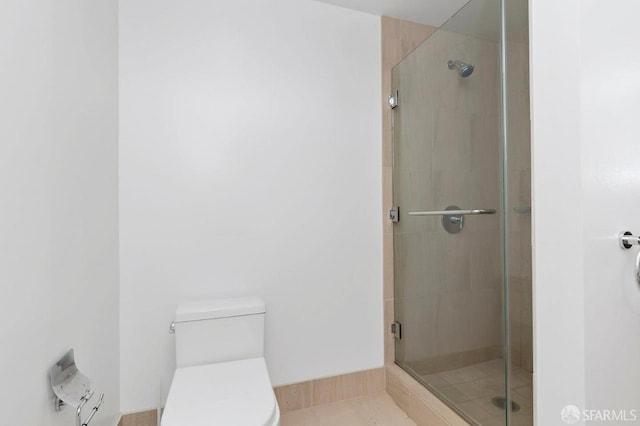 301 Mission St Unit 8E, San Francisco, CA 94105 - bathroom featuring toilet and a stall shower