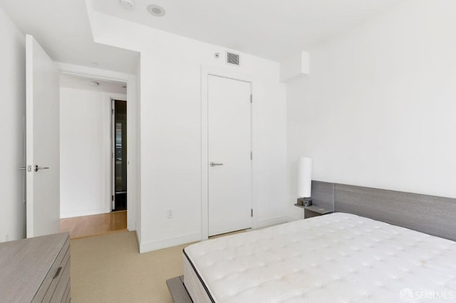 301 Mission St Unit 8E, San Francisco, CA 94105 - bedroom featuring light colored carpet